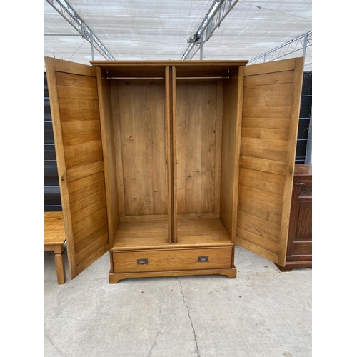 2865 - AN OAK 'ARIGHI BIANCHI' DOUBLE WARDROBE WITH DRAWER TO BASE, 49