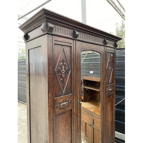 2870 - AN EARLY 20TH CENTURY OAK TWO PIECE BEDROOM SUITE COMPRISING OF MIRROR DOOR WARDROBE AND DRESSING CH... 