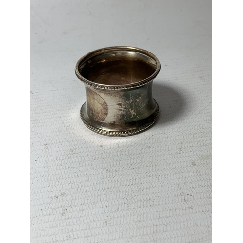 580A - A HALLMARKED BIRMINGHAM SILVER NAPKIN RING