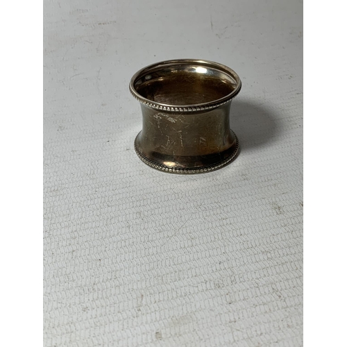 580A - A HALLMARKED BIRMINGHAM SILVER NAPKIN RING