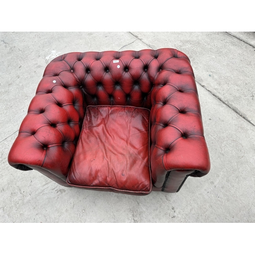 2871 - AN OXBLOOD CHESTERFIELD EASY CHAIR