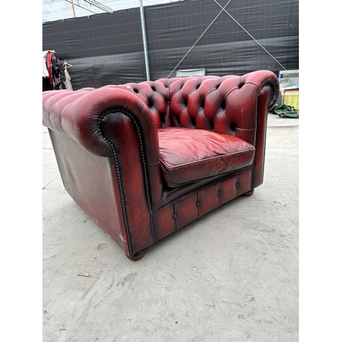 2871 - AN OXBLOOD CHESTERFIELD EASY CHAIR