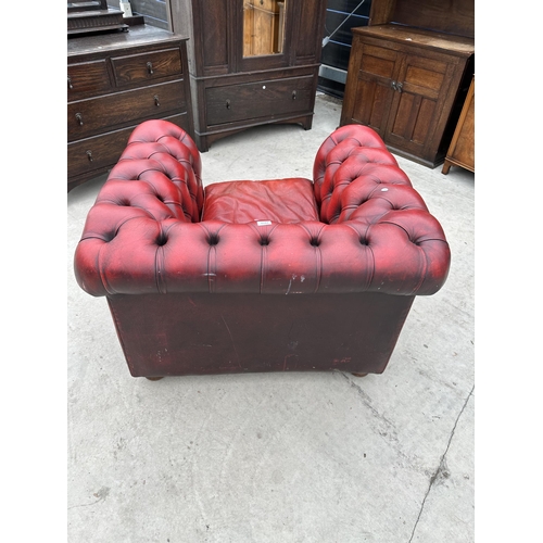 2871 - AN OXBLOOD CHESTERFIELD EASY CHAIR