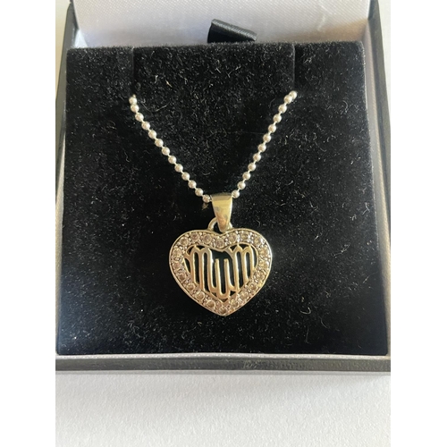 525 - A SILVER NECKLACE WITH MUM PENDANT IN A PRESENTATION BOX