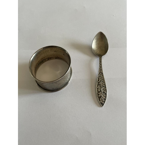 531 - A HALLMARKED BIRMINGHAM SILVER NAPKIN RING AND A MARKED STERLING SPOON