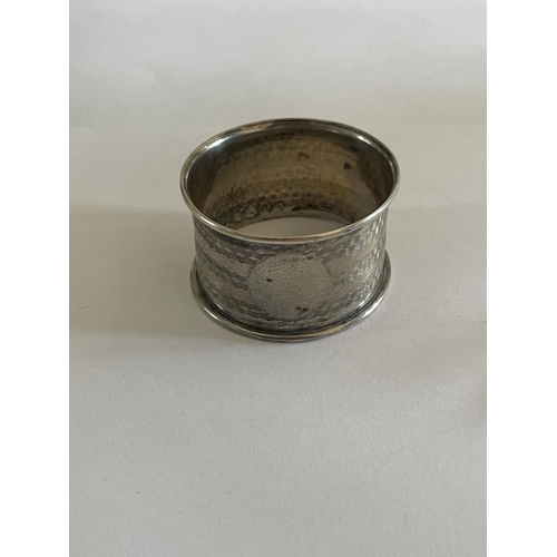 531 - A HALLMARKED BIRMINGHAM SILVER NAPKIN RING AND A MARKED STERLING SPOON