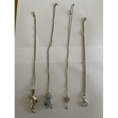 533 - FOUR SILVER NECKLACES WITH PENDANTS