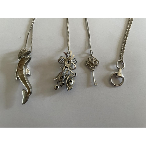 533 - FOUR SILVER NECKLACES WITH PENDANTS