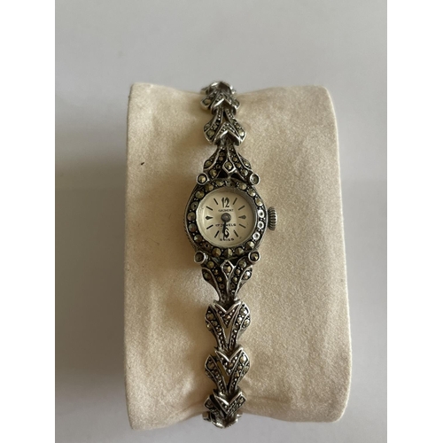 537 - A DECORATIVE SILVER AND MARCASITE STYLE WATCH NOT SEEN WORKING