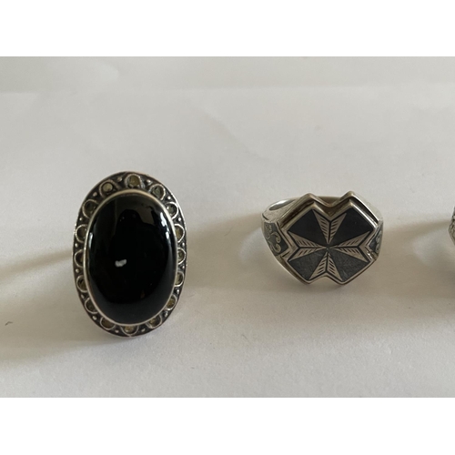 540 - FOUR VARIOUS SILVER RINGS