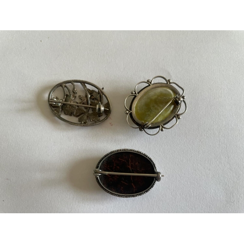 545 - THREE SILVER BROOCHES