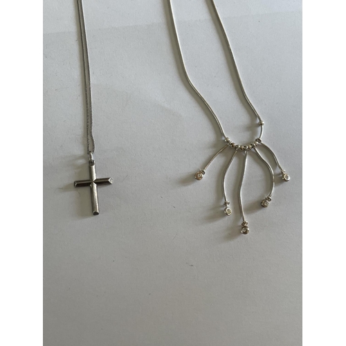 549 - FOUR SILVER NECKLACES WITH PENDANTS