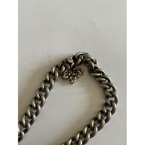 550 - A HEAVY SILVER BRACELETS