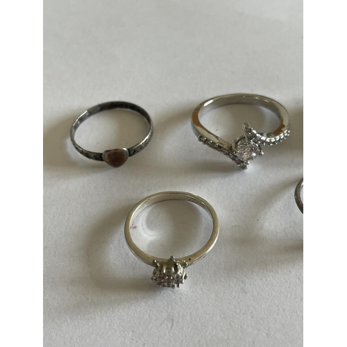 563 - FIVE VARIOUS SILVER RINGS