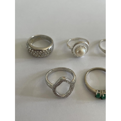 580 - FIVE VARIOUS SILVER RINGS