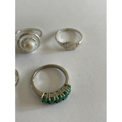 580 - FIVE VARIOUS SILVER RINGS