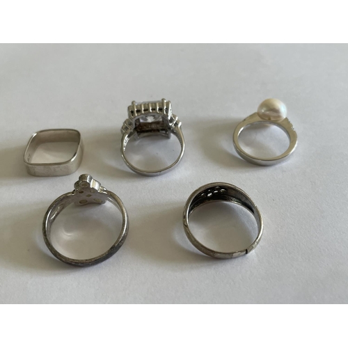 583 - FIVE VARIOUS SILVER RINGS