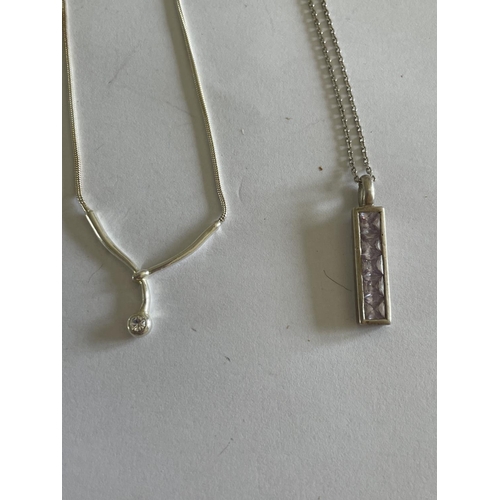 584 - FOUR SILVER NECKLACES WITH PENDANTS