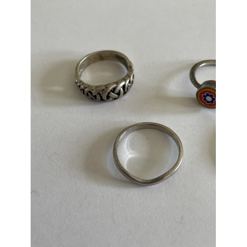 586 - FIVE VARIOUS SILVER RINGS