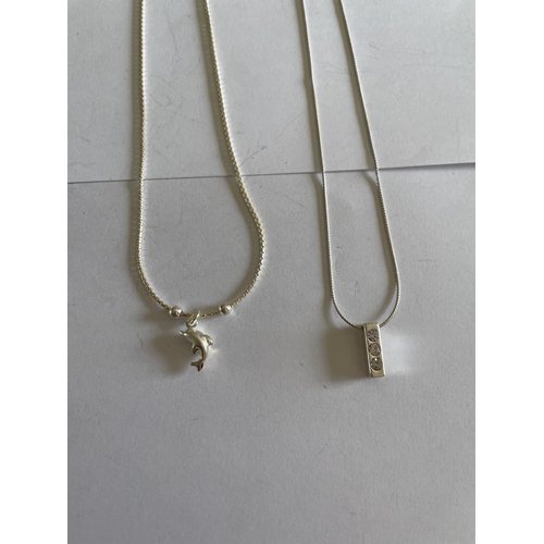 600 - FOUR SILVER NECKLACES WITH PENDANTS