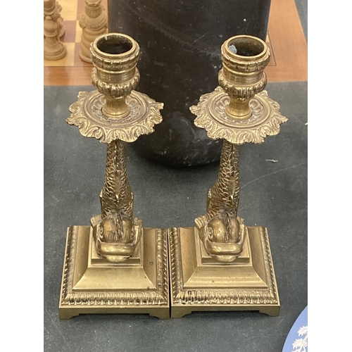 146 - A PAIR OF VINTAGE BRASS DOLPHIN CANDLESTICKS HEIGHT 22CM