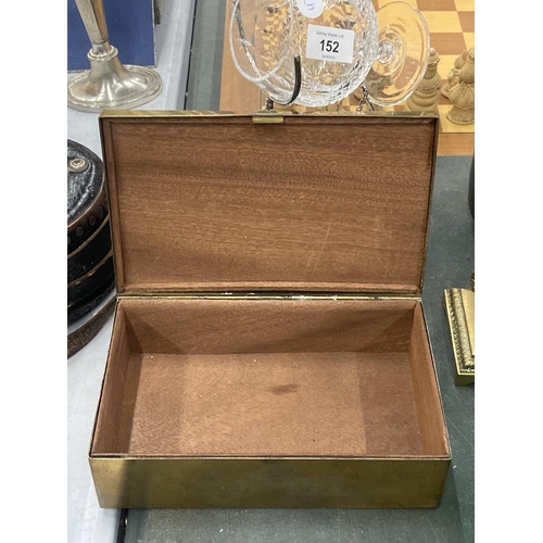 151 - A VINTAGE BRASS BOX WITH AN EMBOSSED IMAGE OF WILD BOARS TO THE LID