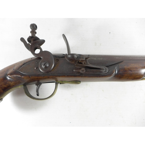 386 - AN EARLY 19TH CENTURY FLINTLOCK PISTOL, 22CM BARREL, WOODEN STOCK, LENGTH 39CM