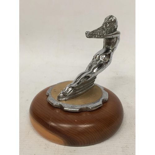 17 - A NUDE LADY CHROME EFFECT CAR MASCOT ON WOODEN BASE