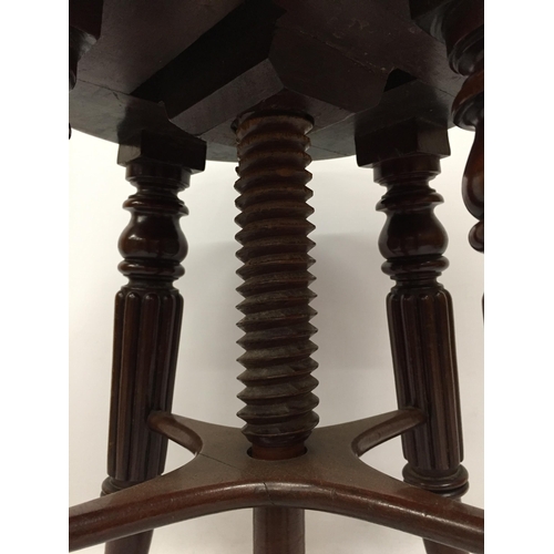 28 - A VICTORIAN WOODEN ADJUSTABLE PIANO STOOL