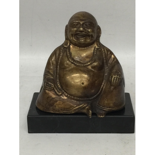 34 - A BRONZE EFFECT MODEL OF A BUDDHA ON MARBLE BASE