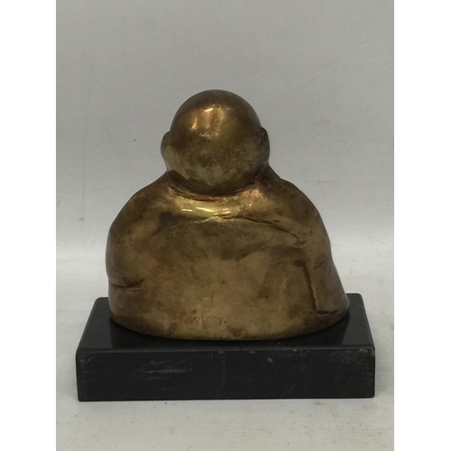 34 - A BRONZE EFFECT MODEL OF A BUDDHA ON MARBLE BASE