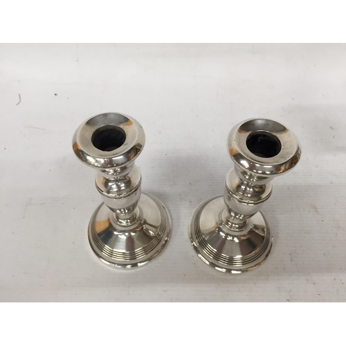 5 - A PAIR OF HALLMARKED SILVER CANDLESTICKS, (WEIGHTED BASES)