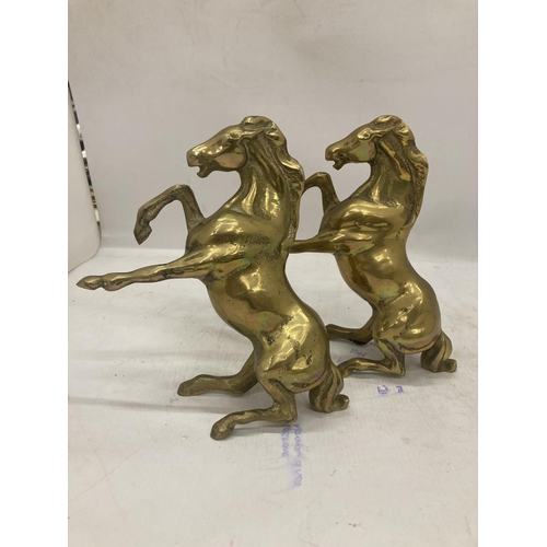 203 - TWO VERY HEAVY BRASS REARING HORSES, HEIGHT 21CM