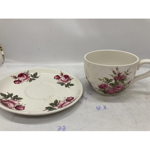 213 - THREE PIECES OF PORTMEIRION TO INCLUDE A TEAPOT, A LARGE CUP AND SAUCER