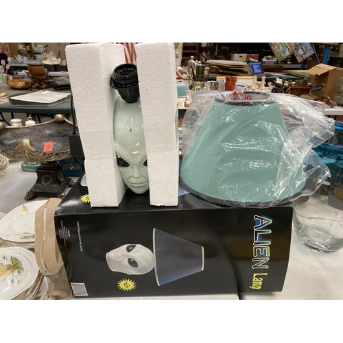 230 - A TABLE LAMP IN THE SHAPE OF AN 'ALIEN' - AS NEW IN BOX