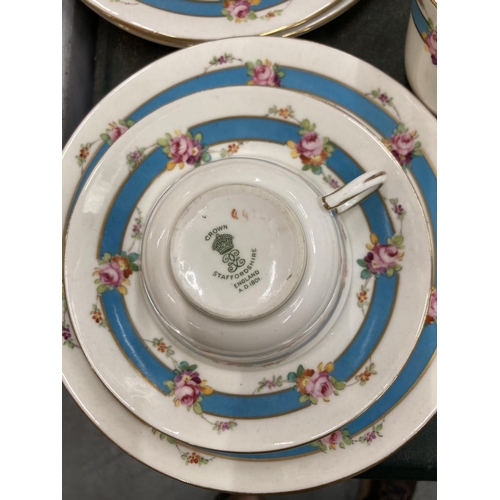 242 - A CROWN STAFFORDSHIRE TEASET TO INCLUDE A CAKE PLATE, CREAM JUG, SUGAR BOWL, CUPS, SAUCERS AND SIDE ... 