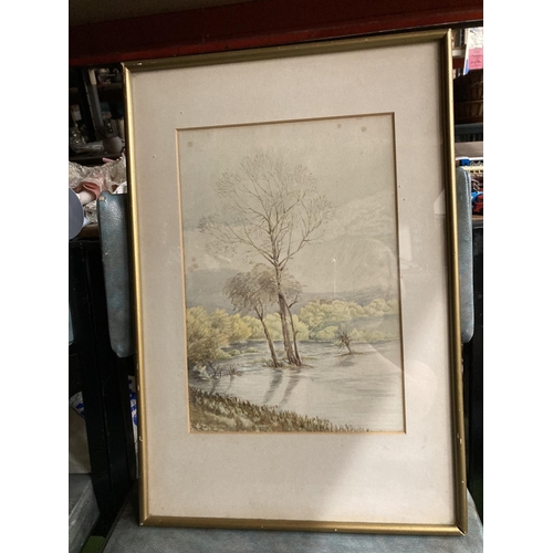 407 - A SIGNED WATERCOLOUR OF THE FLOODED PASTURES