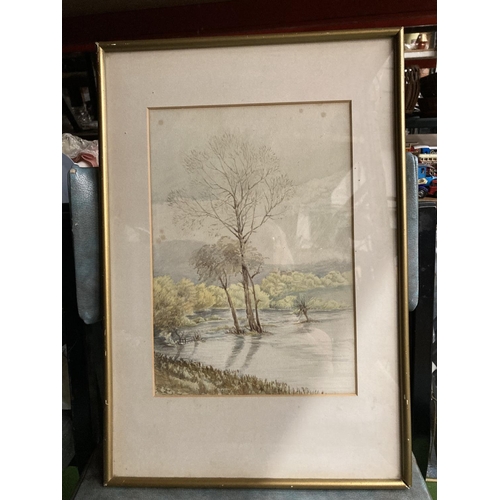 407 - A SIGNED WATERCOLOUR OF THE FLOODED PASTURES