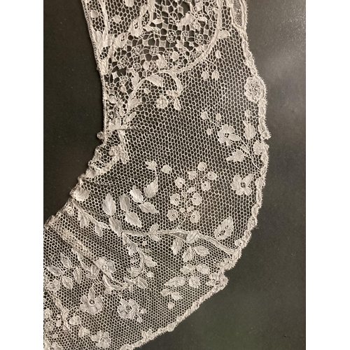 418 - A FRAMED VICTORIAN LACE HORSESHOE SHAWL