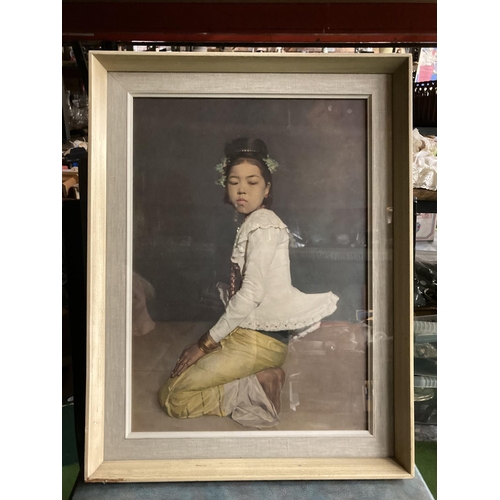 422 - A FRAMED PRINT OF AN ASIAN GIRL BY SIR GERALD KELLY