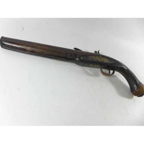 389 - AN INDIAN FLINTLOCK PISTOL, 26CM BARREL, THE STOCK WITH WIRE WORK DECORATION, LENGTH 45CM