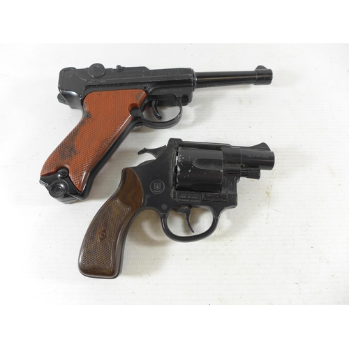 397 - AN AMERICANA 45 CAP GUN AND A LUGER CAP GUN (2)