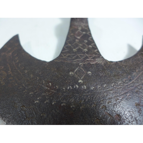 359 - AN AXE HEAD WITH INCISED DECORATION, POSSIBLY AFRICAN, HEIGHT 15.5CM, LENGTH 23.5CM