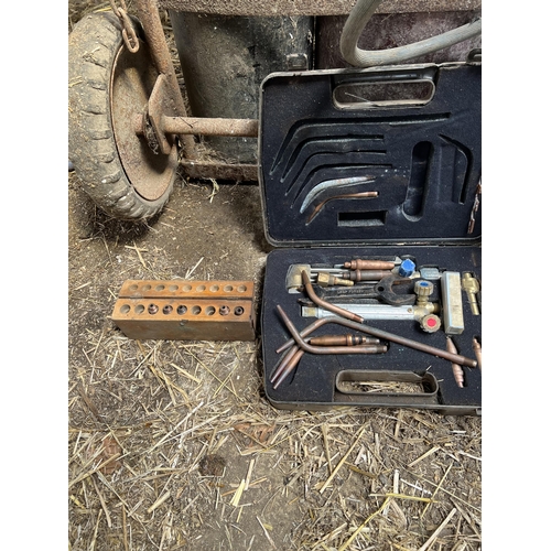 41 - TWO GAS BOTTLES ON A TROLLEY WITH SPARE CUTTERS & NOZZLES + VAT