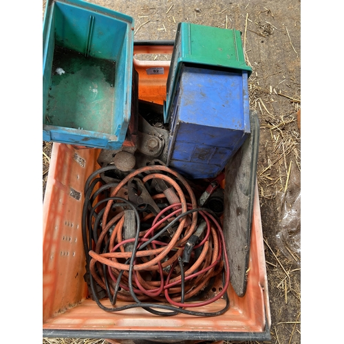 82 - A BOX CONTAINING JUMP LEADS, EXTENTION CABLE ETC +VAT