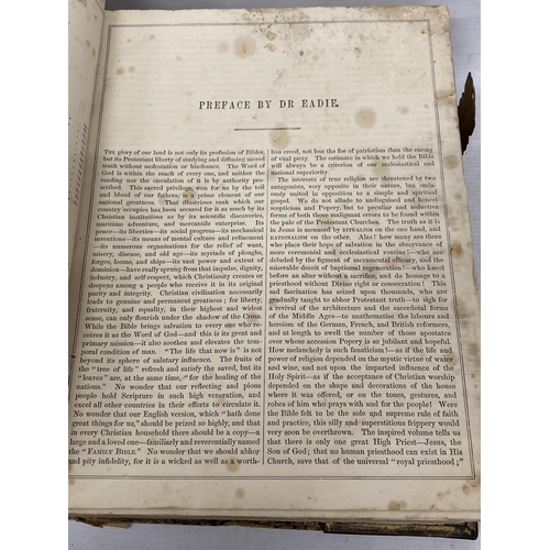 57 - A LARGE ANTIQUARIAN HOLY BIBLE WITH COLOUR AND BLACK AND WHITE PLATES, SOME DAMAGE TO THE COVER AND ... 