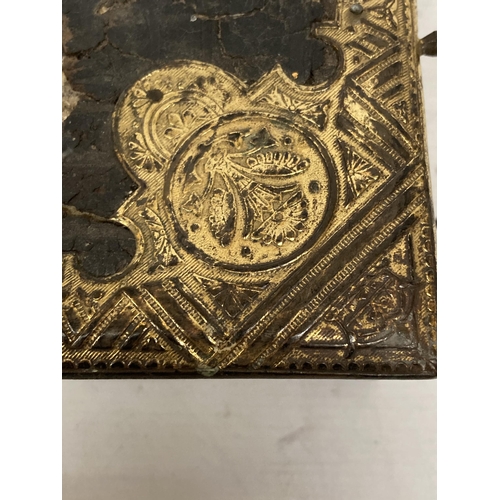 57 - A LARGE ANTIQUARIAN HOLY BIBLE WITH COLOUR AND BLACK AND WHITE PLATES, SOME DAMAGE TO THE COVER AND ... 