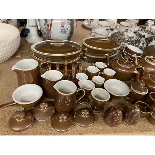 941 - A LARGE COLLECTION OF MEHUN, FRANCE, TREACLE GLAZE SERVING ITEMS, LIDDED DISHES ETC