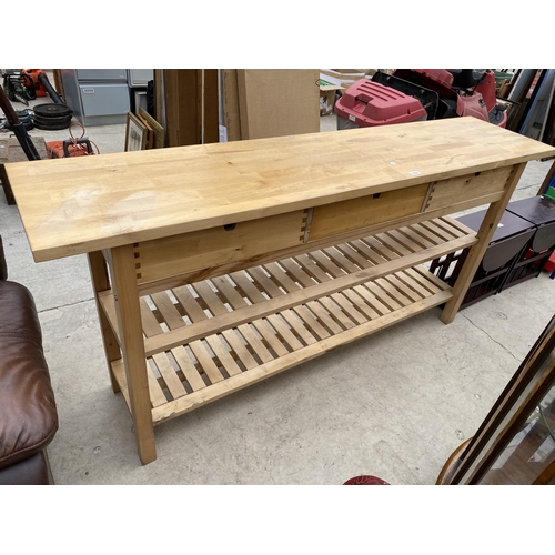 A MODERN THREE TIER KITCHEN WORK STATION WITH WOOD BLOCK TOP AND THREE