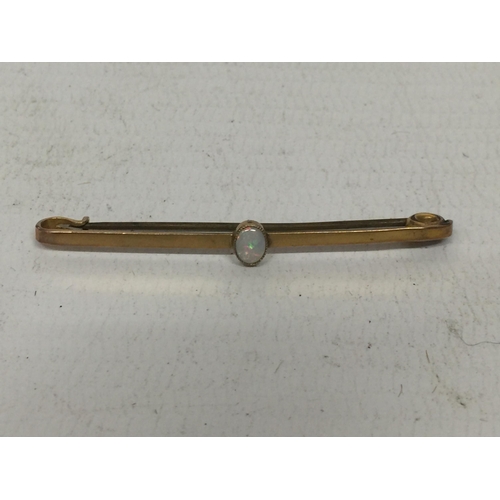 504 - AN OPAL 9CT BAR BROOCH